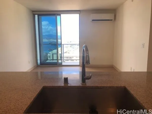 a view of an empty room and window