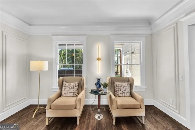 a kitchen with a sink window and cabinets