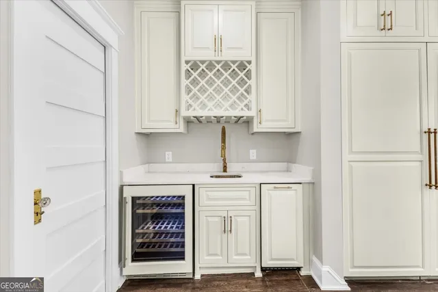 a bathroom with a glass shower door and a bathtub