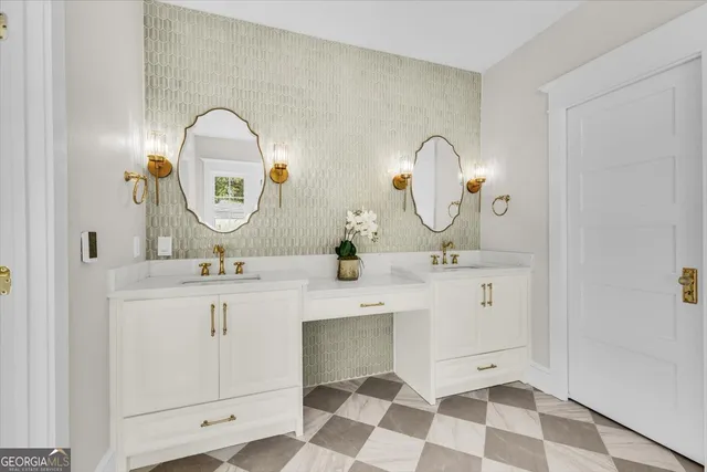 a living room with furniture a chandelier and a window