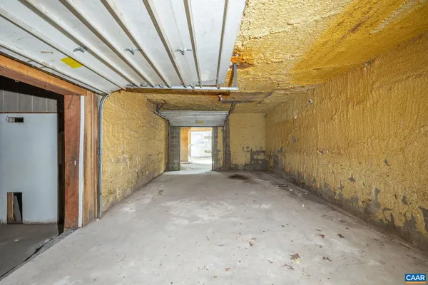 a view of empty room with windows