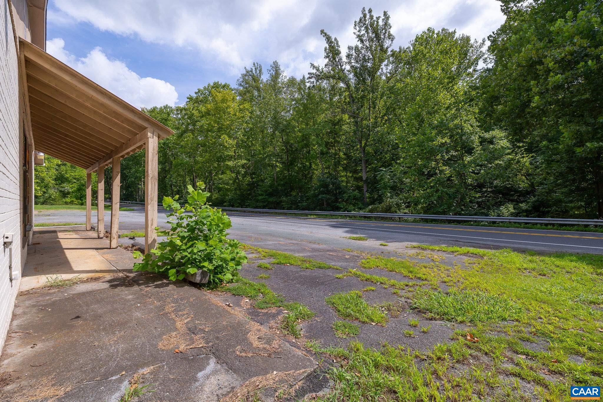 4952 Irish Road Schuyler, VA 22969 - Photo 19 of 33 a view of backyard with swimming pool and outdoor seating