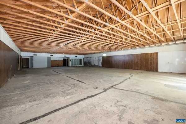 a view of a room with wooden roof