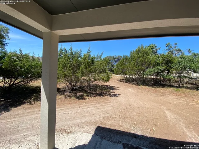 a view of swimming pool from a balcony