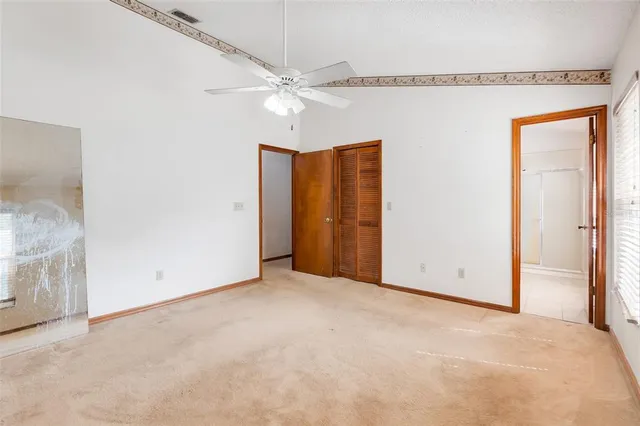 a bathroom with a double vanity sink toilet and shower