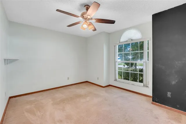 a view of backyard with deck