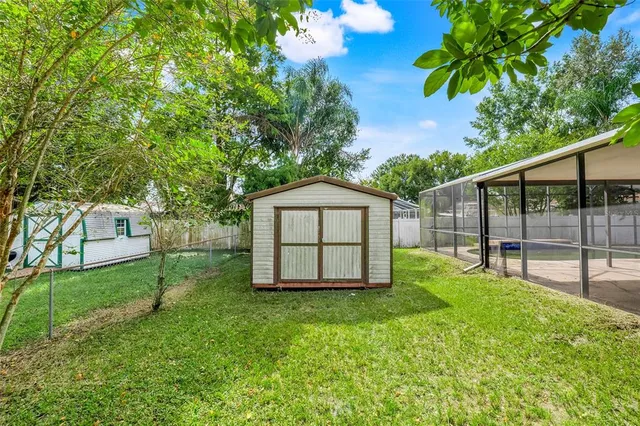 a house with a tree in front of a house