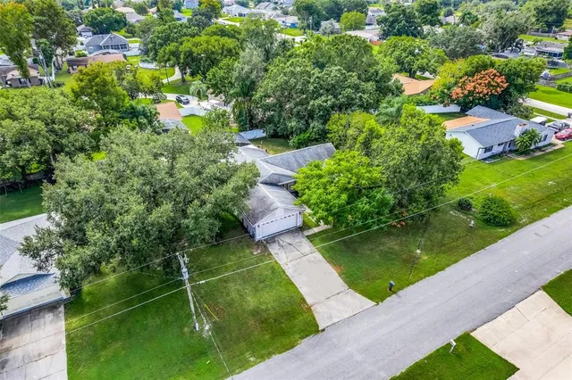 a view of a garden with a building