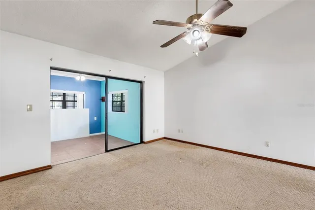 an empty room with fan