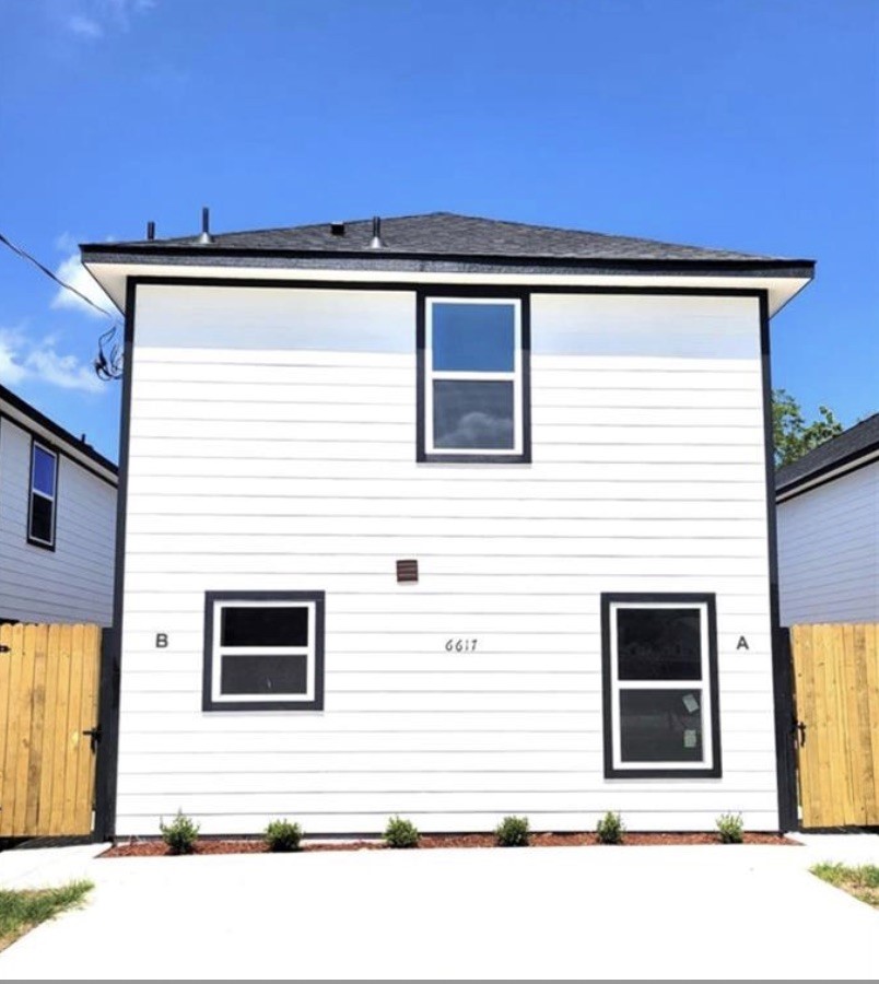 6617 Bacher Street, Unit B Houston, TX 77028 - Photo 2 of 25 a black and white photo of a building