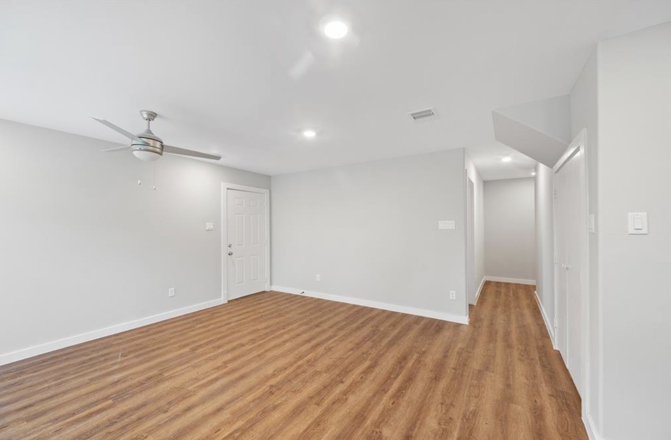 6617 Bacher Street, Unit B Houston, TX 77028 - Photo 8 of 25 a view of empty room with wooden floor