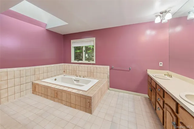 a bathroom with a sink a vanity and a mirror