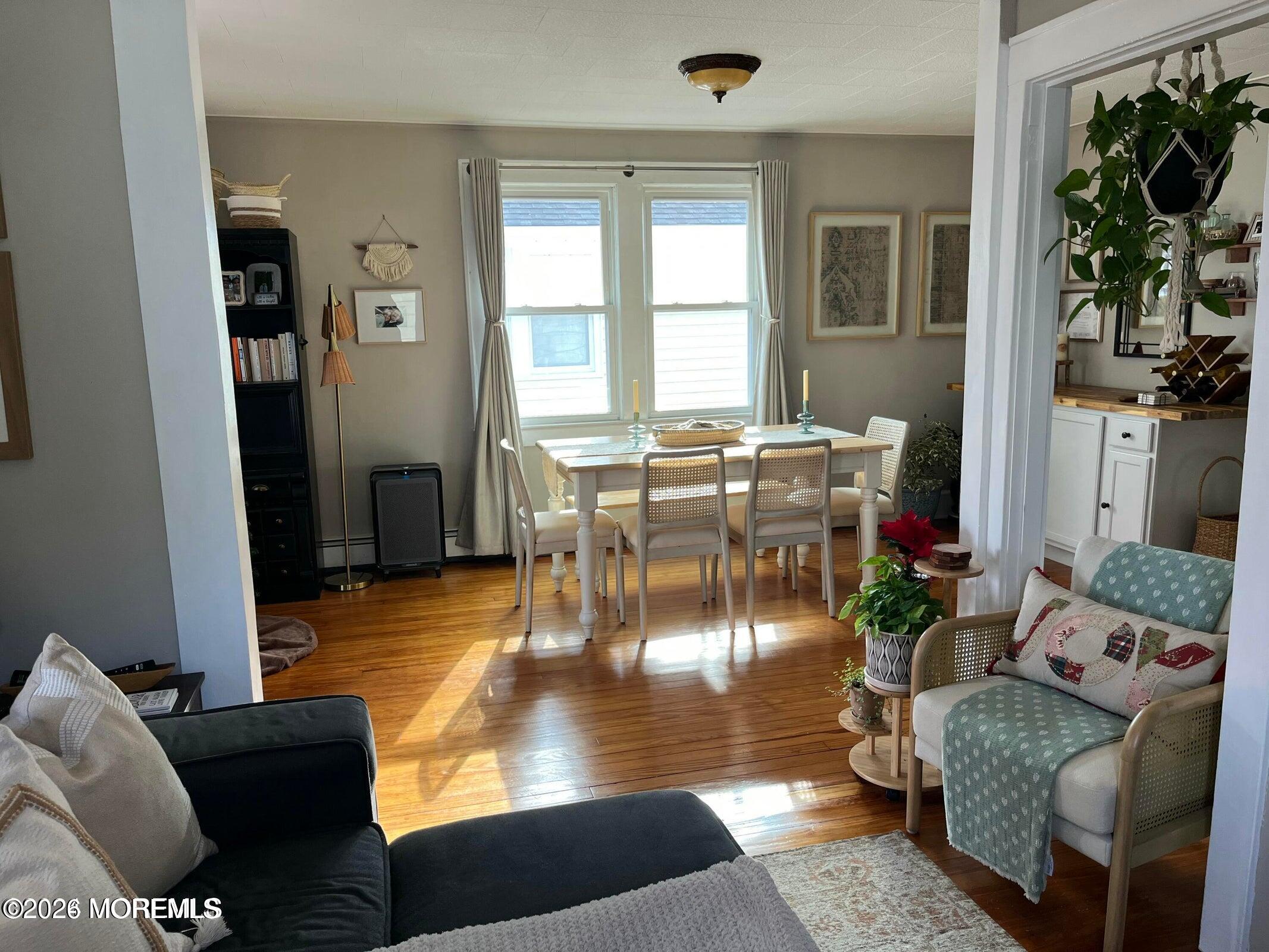 1236 Maplewood Road Belmar, NJ 07719 - Photo 12 of 44 a living room with furniture and a large window