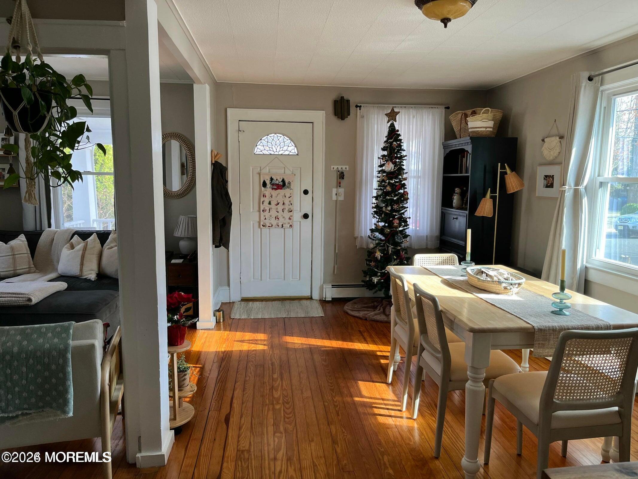 1236 Maplewood Road Belmar, NJ 07719 - Photo 14 of 44 a dining room with furniture and window