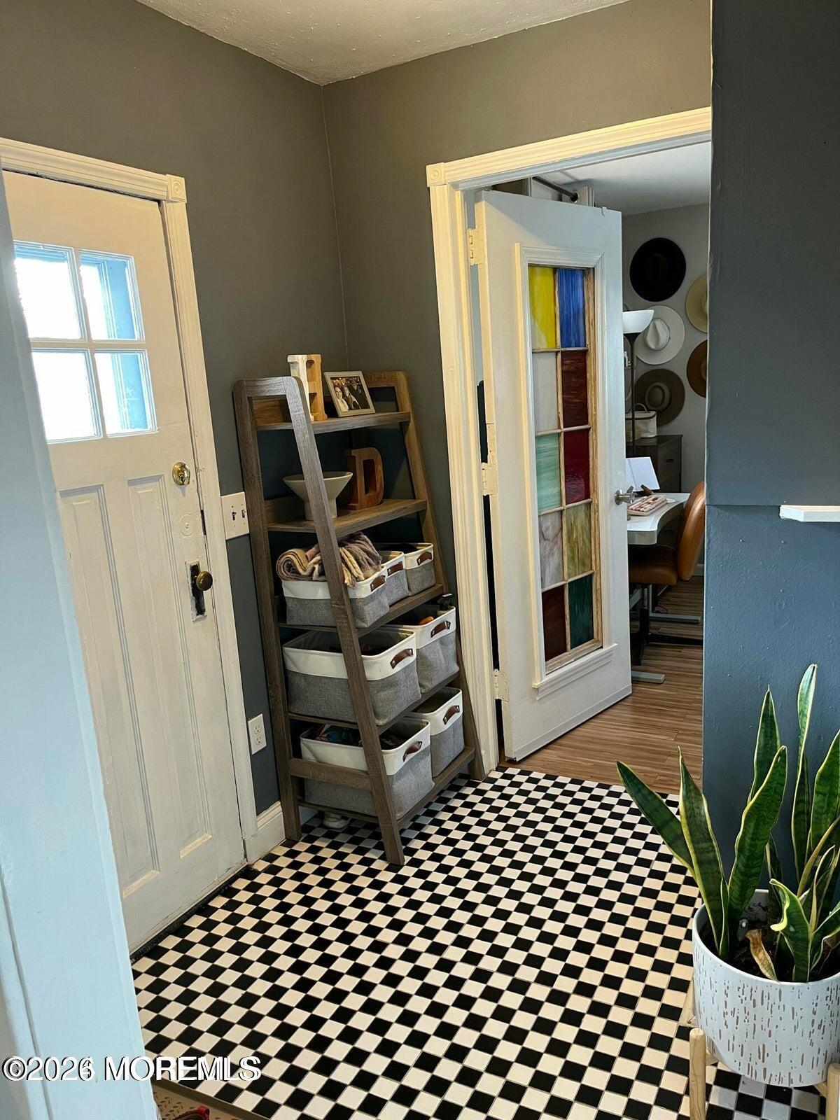 1236 Maplewood Road Belmar, NJ 07719 - Photo 19 of 44 a bedroom with furniture and wooden floor