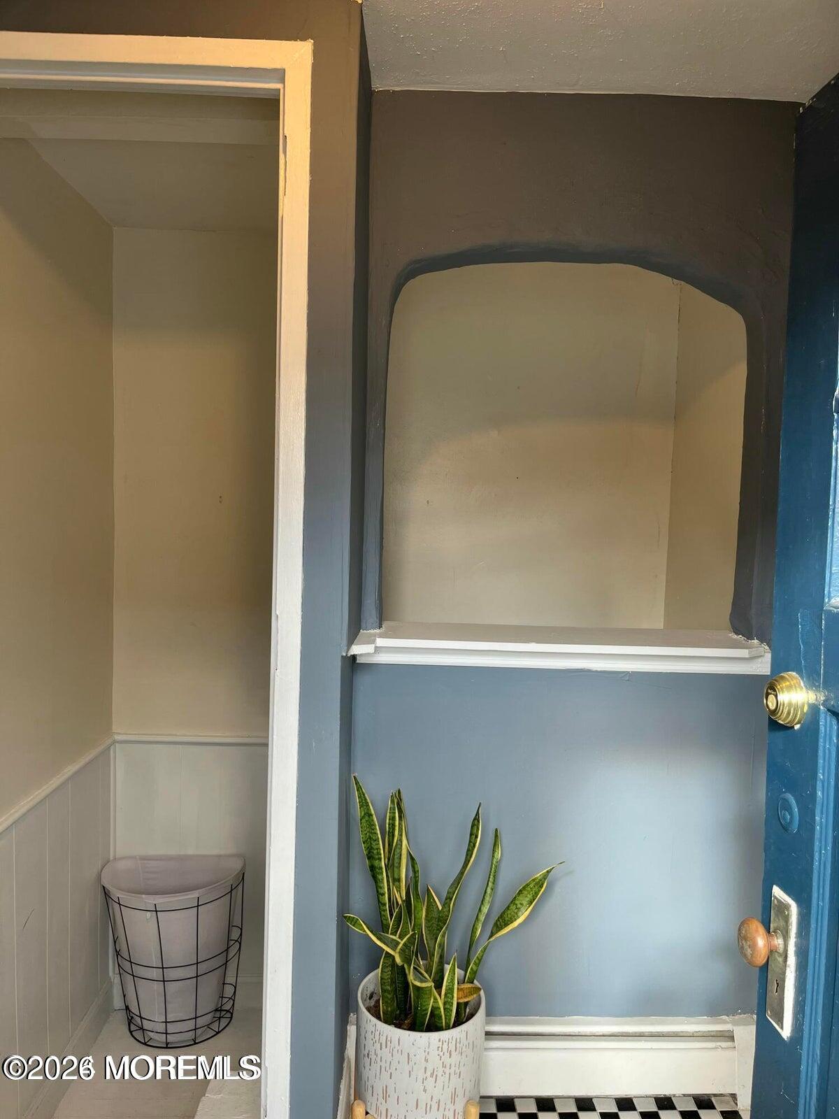1236 Maplewood Road Belmar, NJ 07719 - Photo 20 of 44 a bathroom with a potted plant