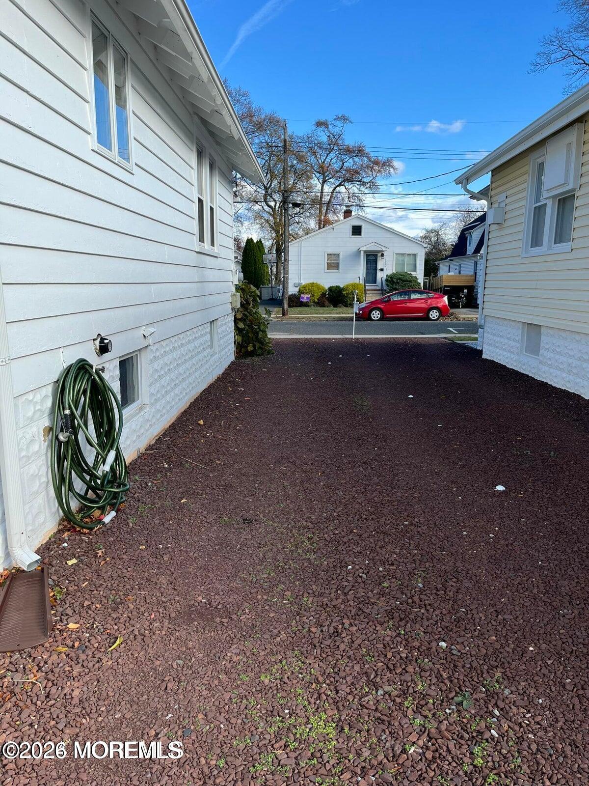 1236 Maplewood Road Belmar, NJ 07719 - Photo 36 of 44 a view of road with card