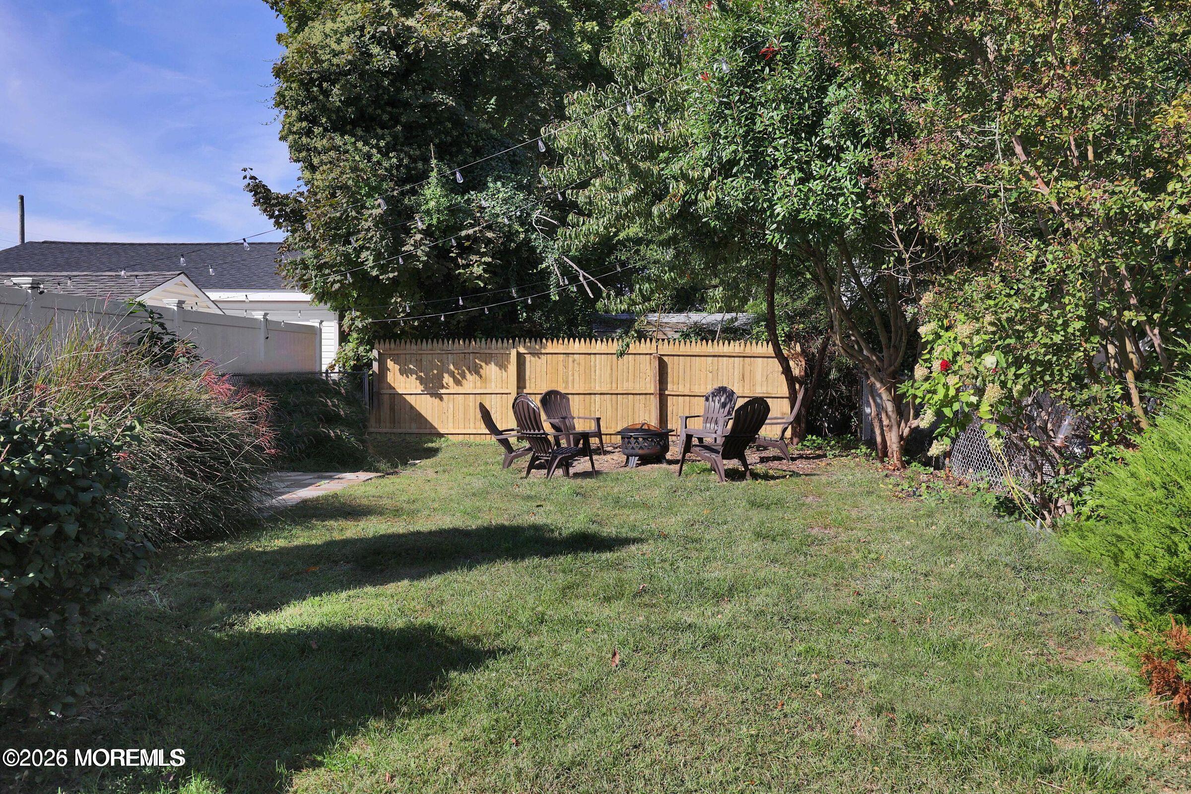 1236 Maplewood Road Belmar, NJ 07719 - Photo 37 of 44 a view of backyard with green space