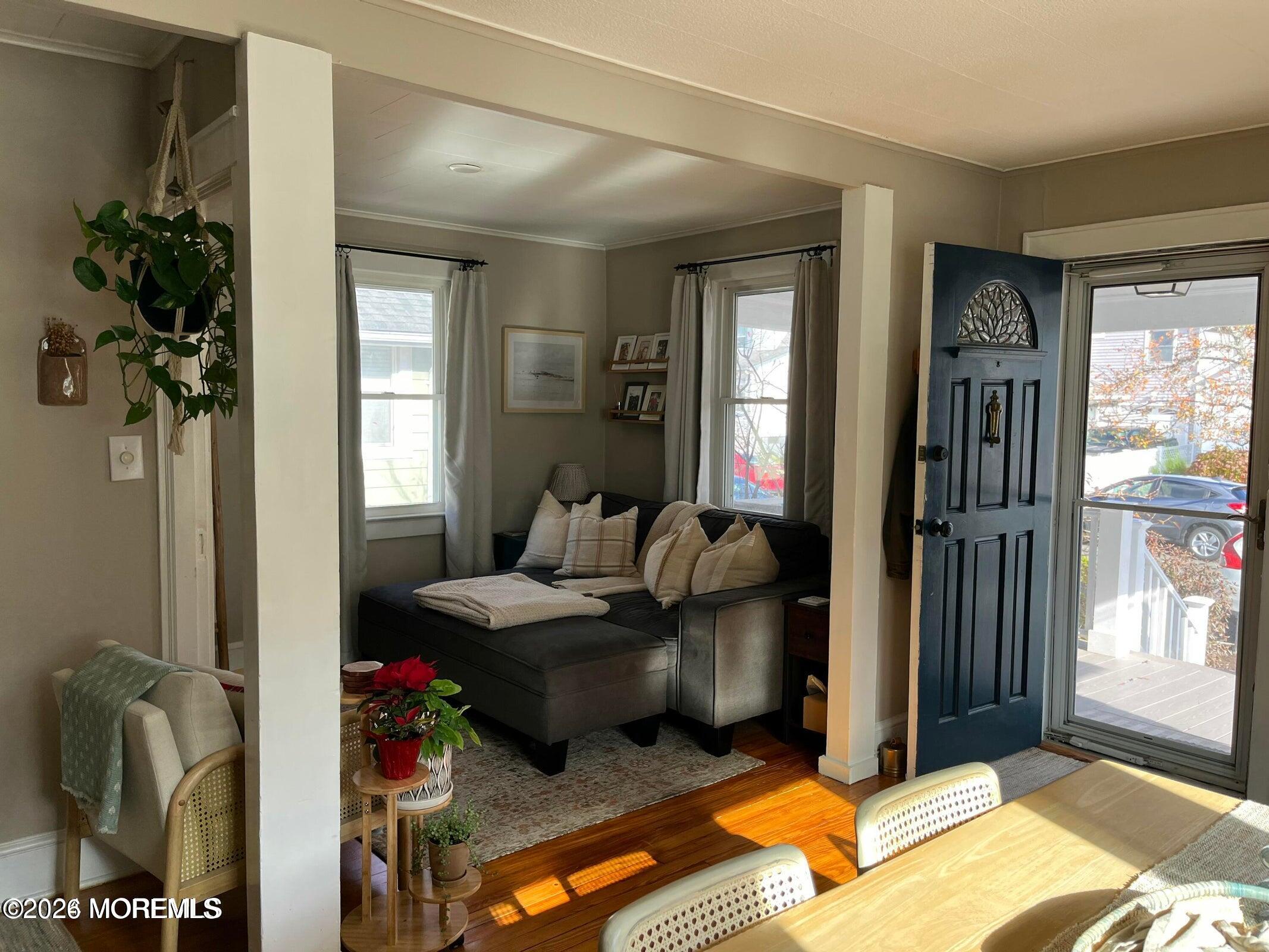 1236 Maplewood Road Belmar, NJ 07719 - Photo 7 of 44 a living room with furniture and a potted plant