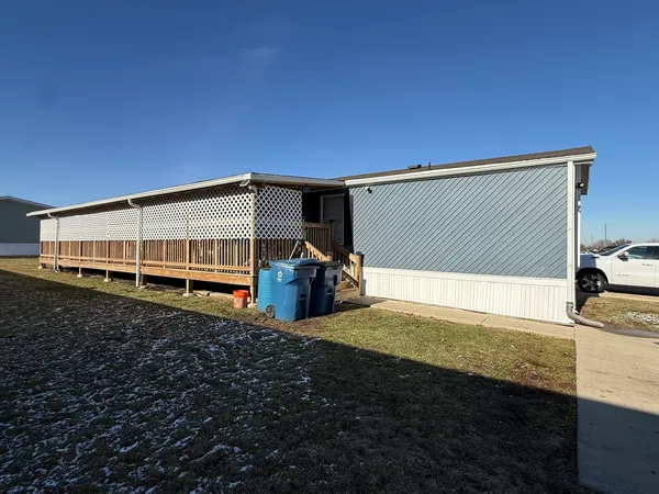 a view of backyard with cabin