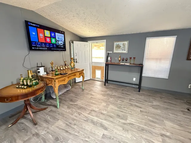 a room with furniture and window