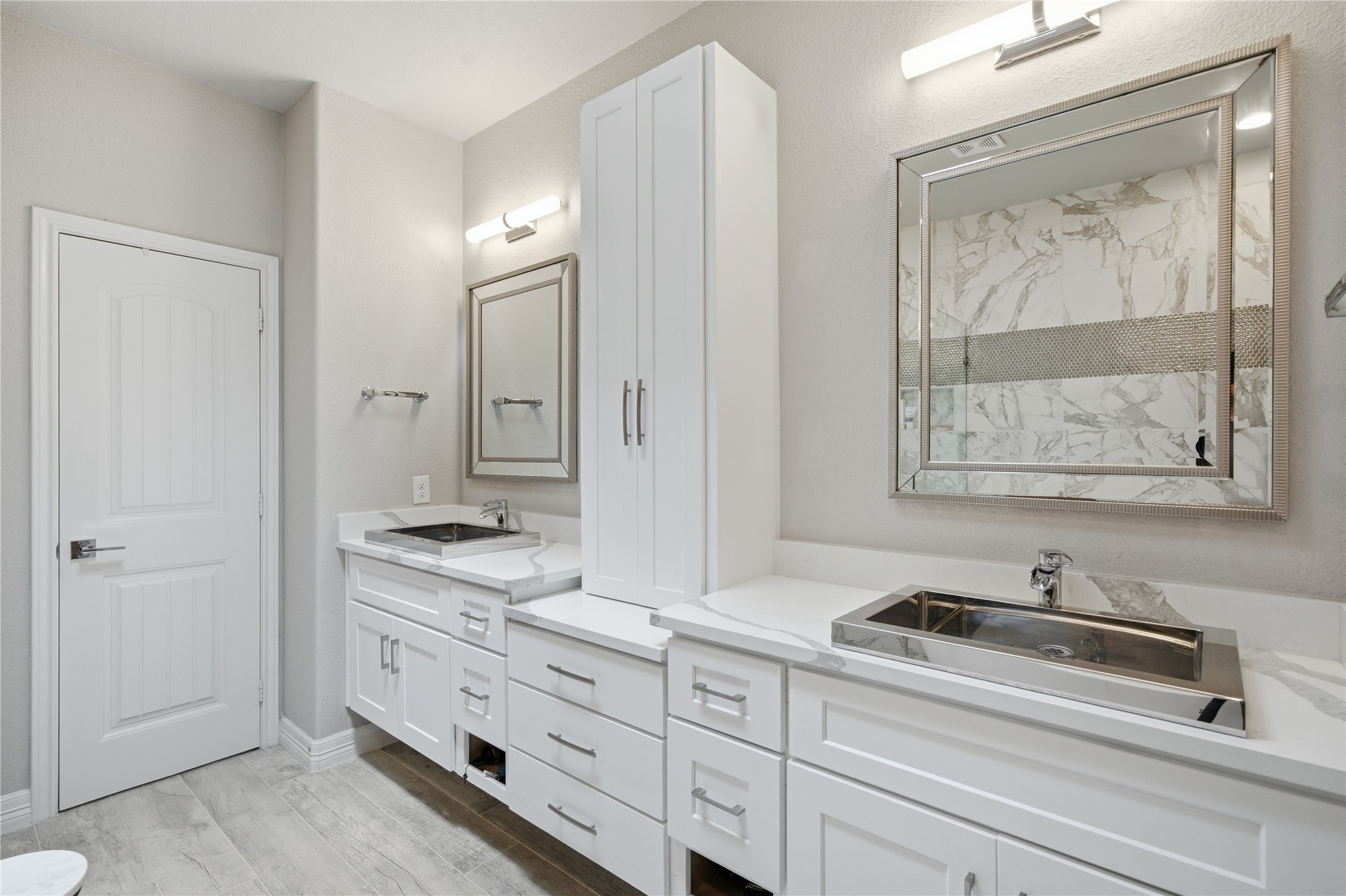 4412 New Orleans Street, Unit B Houston, TX 77020 - Photo 26 of 42 Double sinks and floating cabinets in the primary bathroom