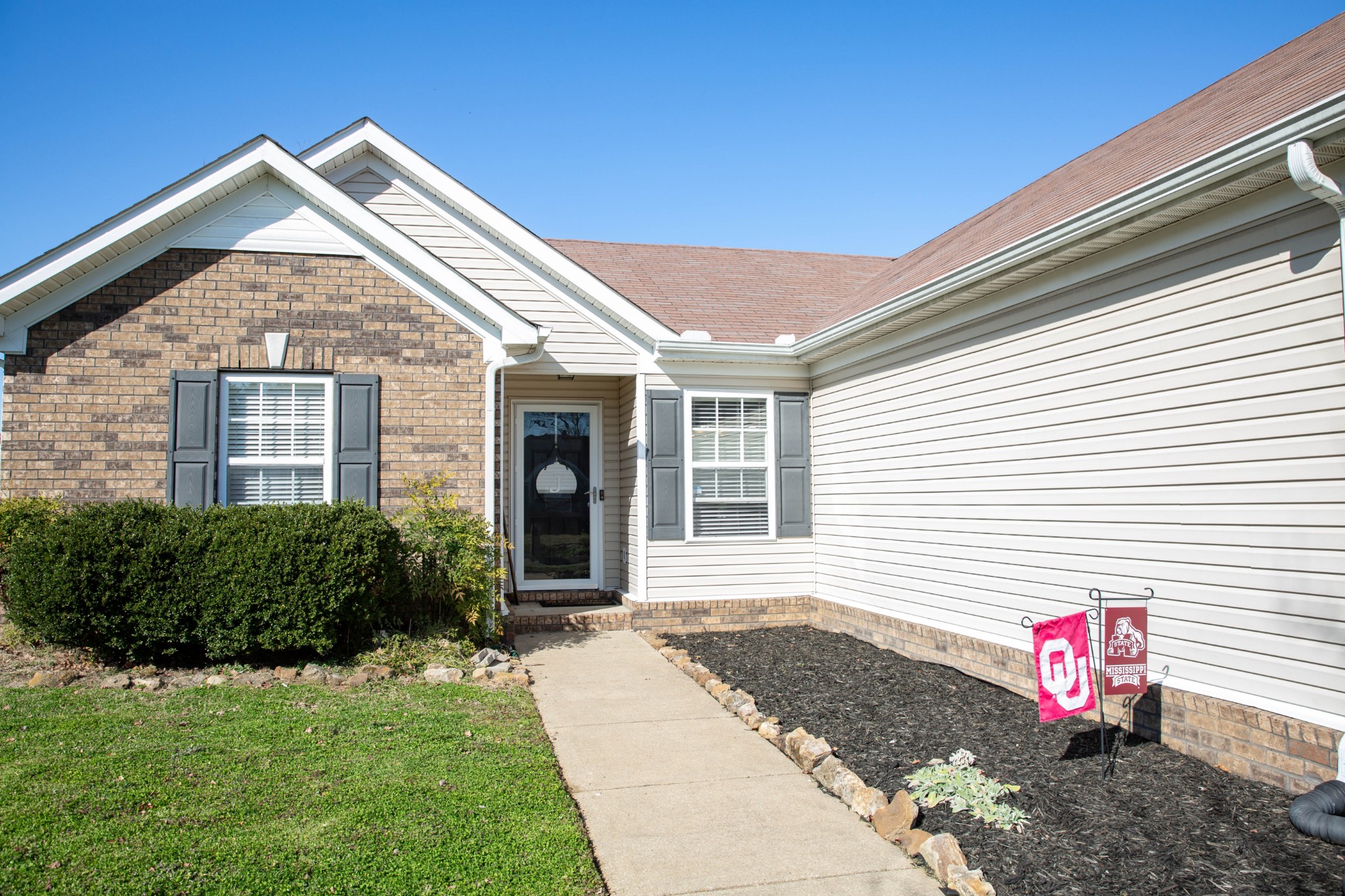 1880 Portway Road Spring Hill, TN 37174 - Photo 3 of 29 a front view of a house with a yard