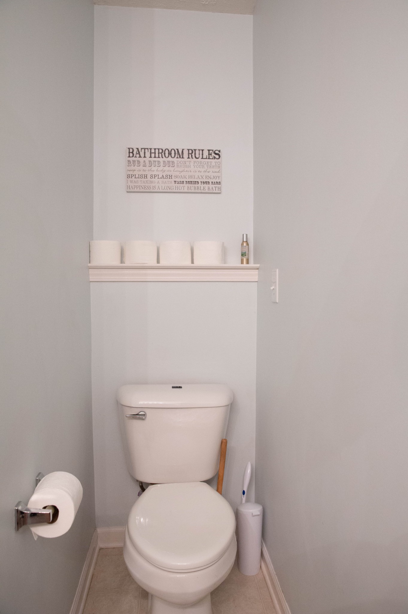 1880 Portway Road Spring Hill, TN 37174 - Photo 22 of 29 a white toilet sitting next to a sink