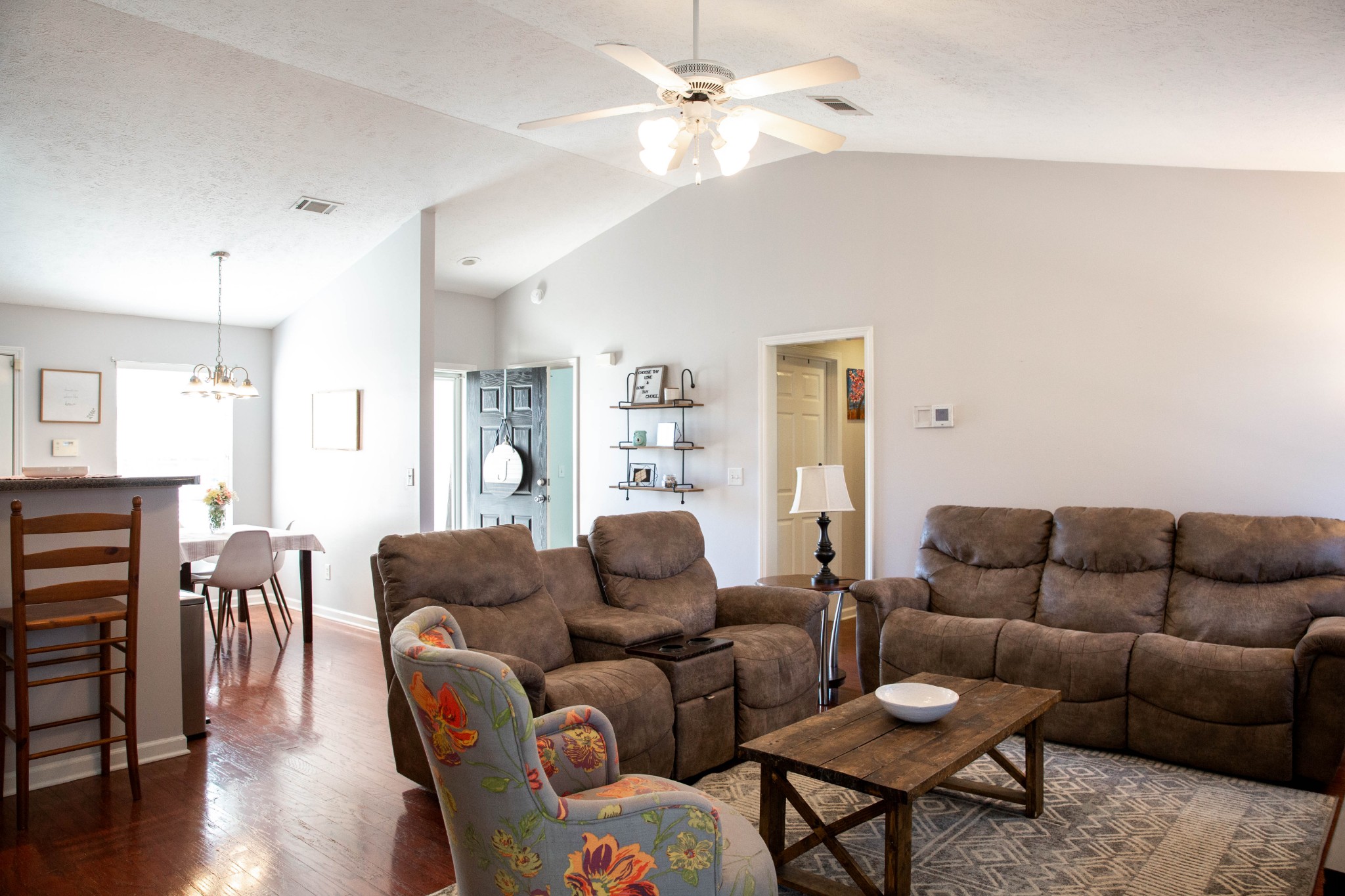 1880 Portway Road Spring Hill, TN 37174 - Photo 5 of 29 a living room with furniture a wooden floor and chandelier