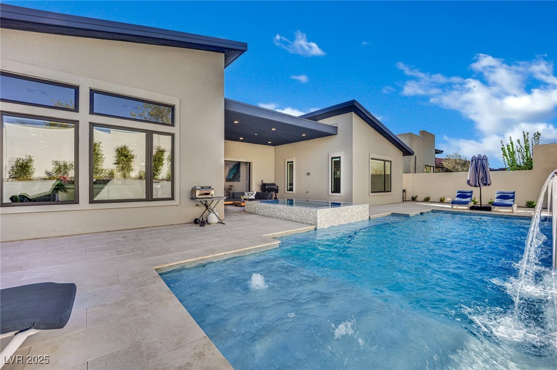397 Highview Rdg Avenue Las Vegas, NV 89138 - Photo 11 of 97 View of swimming pool with a patio
