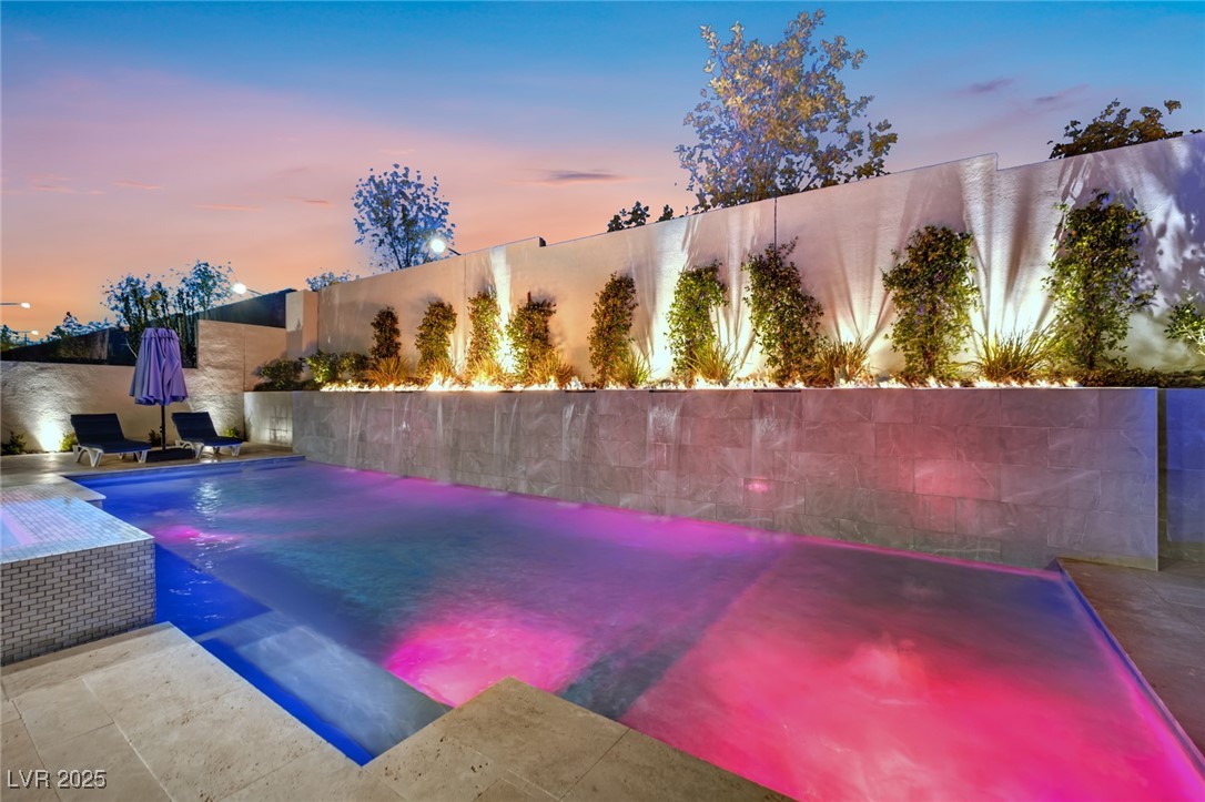 397 Highview Rdg Avenue Las Vegas, NV 89138 - Photo 17 of 97 View of pool featuring a patio area and a fenced backyard