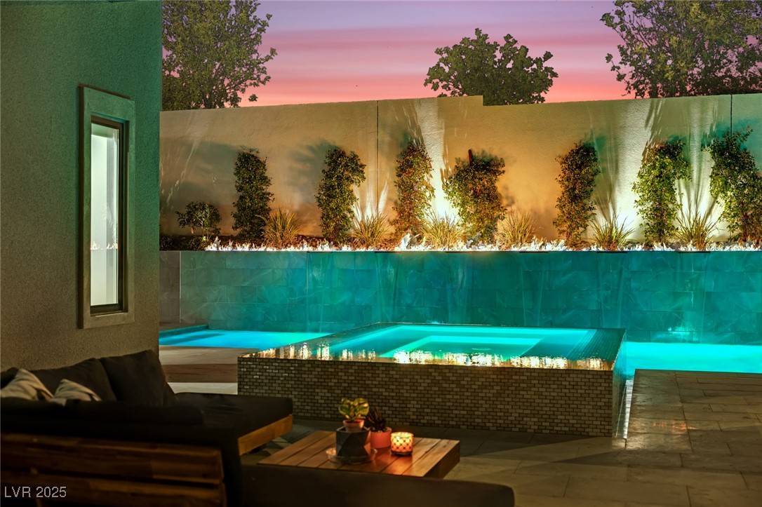 397 Highview Rdg Avenue Las Vegas, NV 89138 - Photo 30 of 97 View of swimming pool featuring a deck