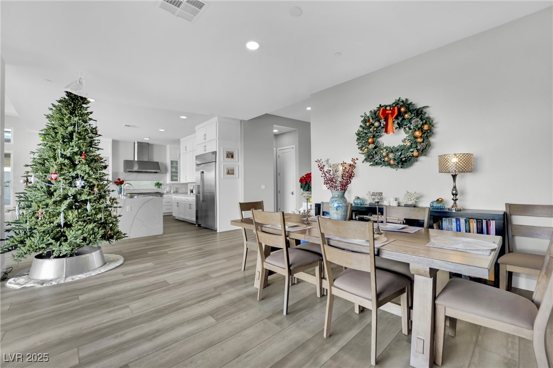 397 Highview Rdg Avenue Las Vegas, NV 89138 - Photo 33 of 97 Dining area with light wood finished floors and recessed lighting