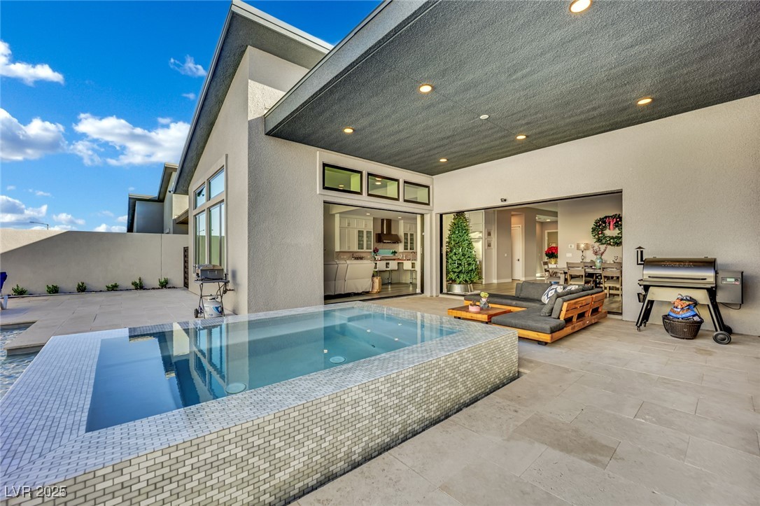 397 Highview Rdg Avenue Las Vegas, NV 89138 - Photo 5 of 97 View of pool featuring a covered patio area and an infinity pool