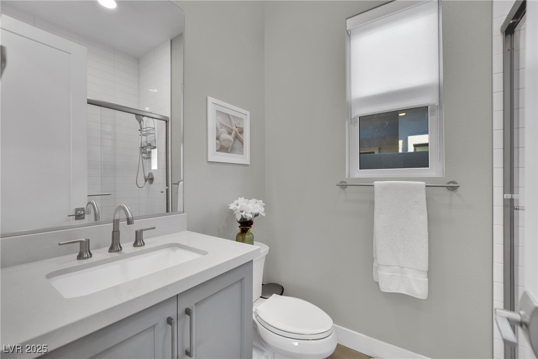397 Highview Rdg Avenue Las Vegas, NV 89138 - Photo 54 of 97 Bathroom featuring vanity and a shower with shower door