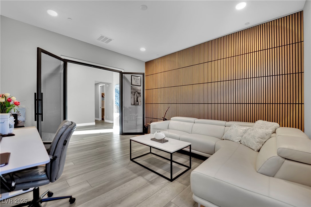 397 Highview Rdg Avenue Las Vegas, NV 89138 - Photo 57 of 97 Office with light wood-style floors, recessed lighting, and an accent wall