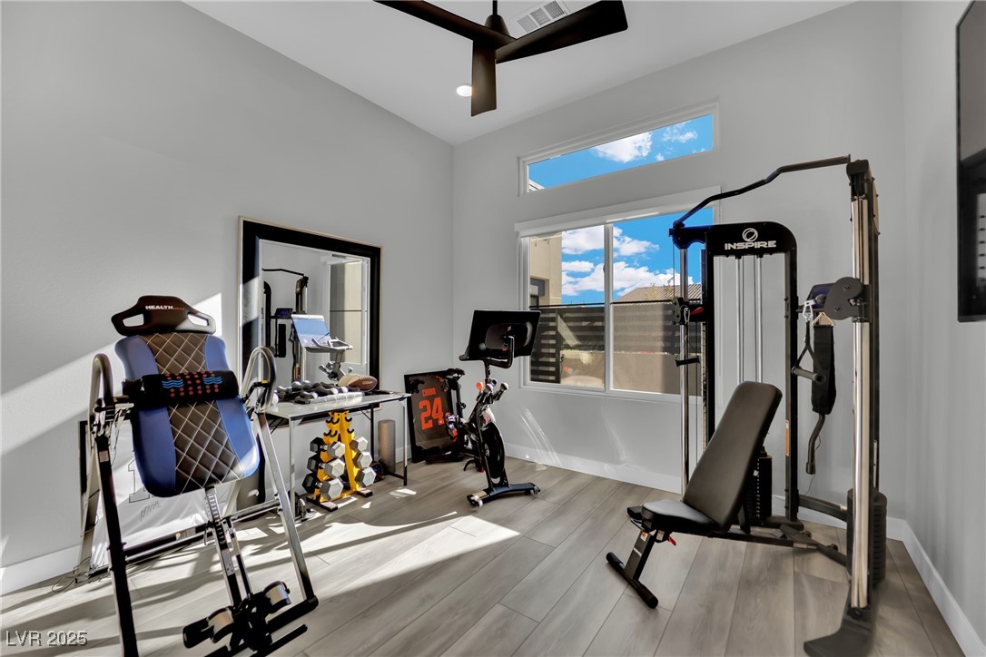 397 Highview Rdg Avenue Las Vegas, NV 89138 - Photo 59 of 97 Workout room with light wood-type flooring and a ceiling fan
