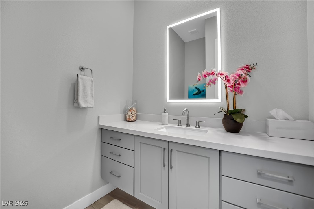 397 Highview Rdg Avenue Las Vegas, NV 89138 - Photo 62 of 97 Bathroom featuring vanity and baseboards