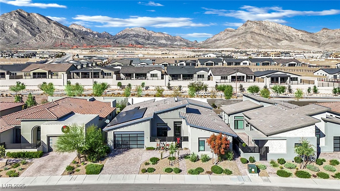 397 Highview Rdg Avenue Las Vegas, NV 89138 - Photo 74 of 97 Aerial perspective of suburban area with a mountainous background