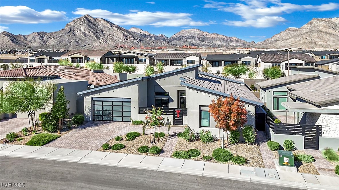 397 Highview Rdg Avenue Las Vegas, NV 89138 - Photo 76 of 97 View of mountain backdrop featuring nearby suburban area