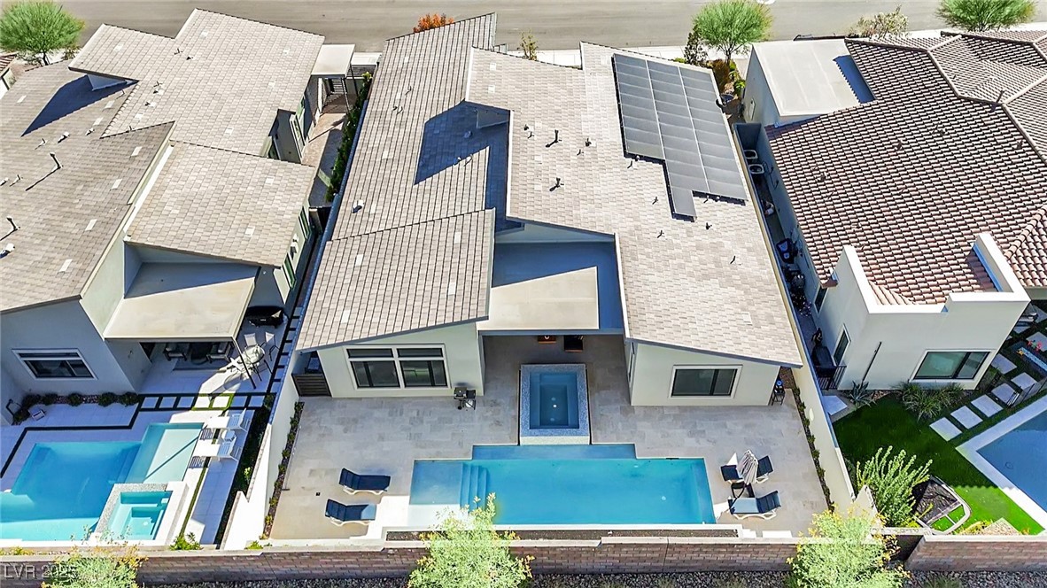 397 Highview Rdg Avenue Las Vegas, NV 89138 - Photo 83 of 97 Aerial perspective of suburban area featuring a pool