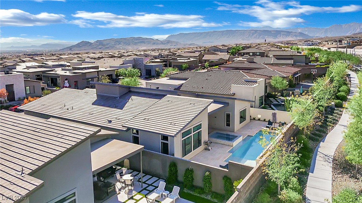397 Highview Rdg Avenue Las Vegas, NV 89138 - Photo 84 of 97 Aerial perspective of suburban area with a mountain backdrop