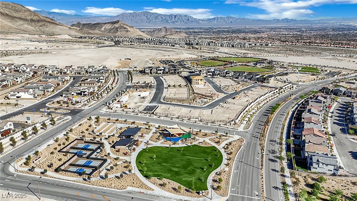 397 Highview Rdg Avenue Las Vegas, NV 89138 - Photo 88 of 97 Aerial view of property and surrounding area with mountains