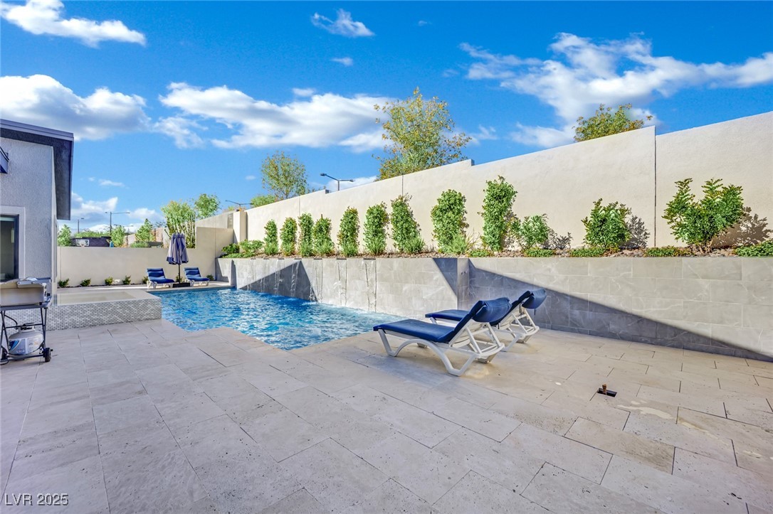 397 Highview Rdg Avenue Las Vegas, NV 89138 - Photo 9 of 97 Outdoor pool featuring a patio and a fenced backyard