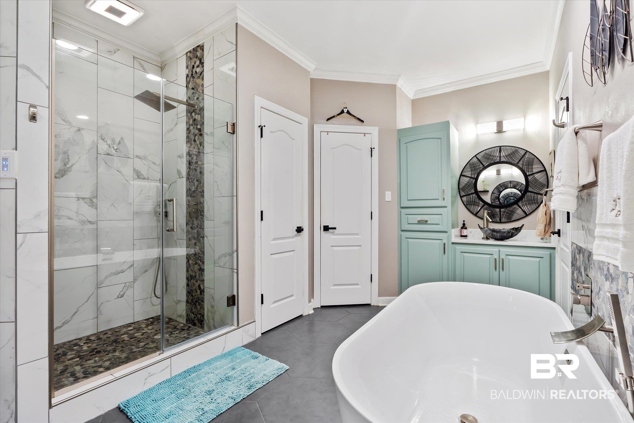 3600 Russells Lane Mobile, AL 36619 - Photo 15 of 43 Bathroom featuring tile patterned flooring, crown molding, separate shower and tub, and vanity