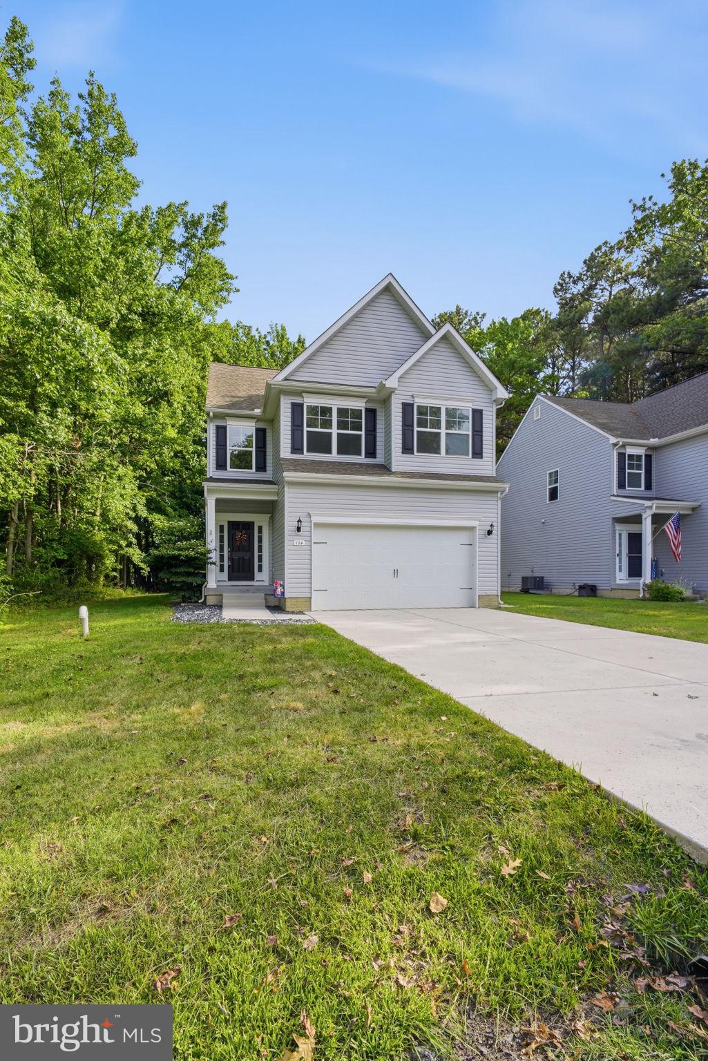 124 Riverside Drive Chester, MD 21619 - Photo 3 of 44 Charming home nestled in lush greenery.