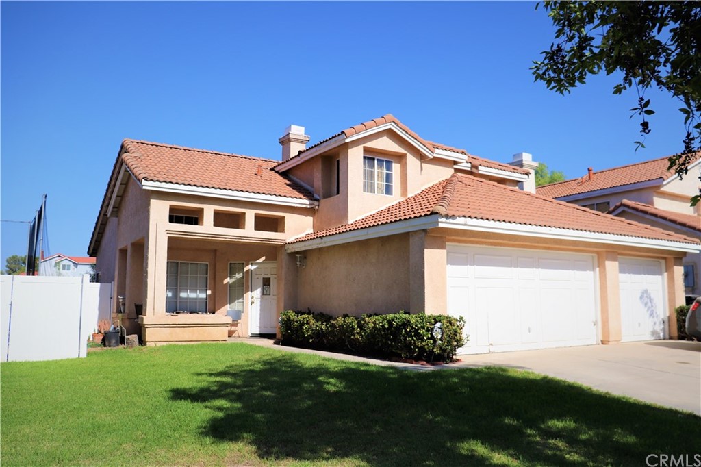 524 Harding Road Corona, CA 92879 - Photo 1 of 1 a front view of a house with a yard
