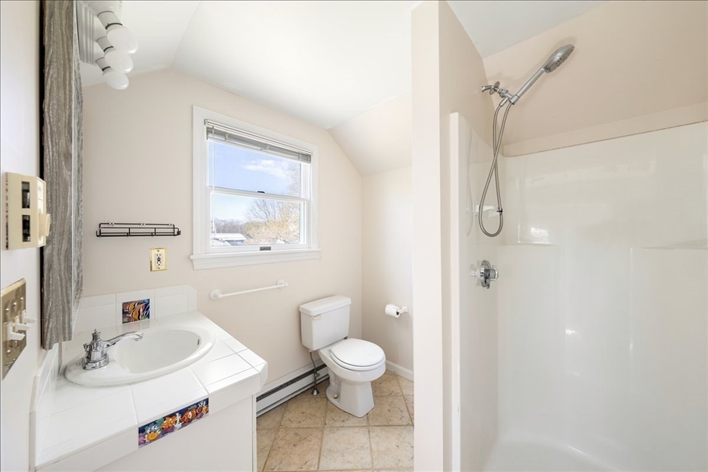 10 2nd Street Natick, MA 01760 - Photo 22 of 31 a bathroom with a sink a toilet and shower