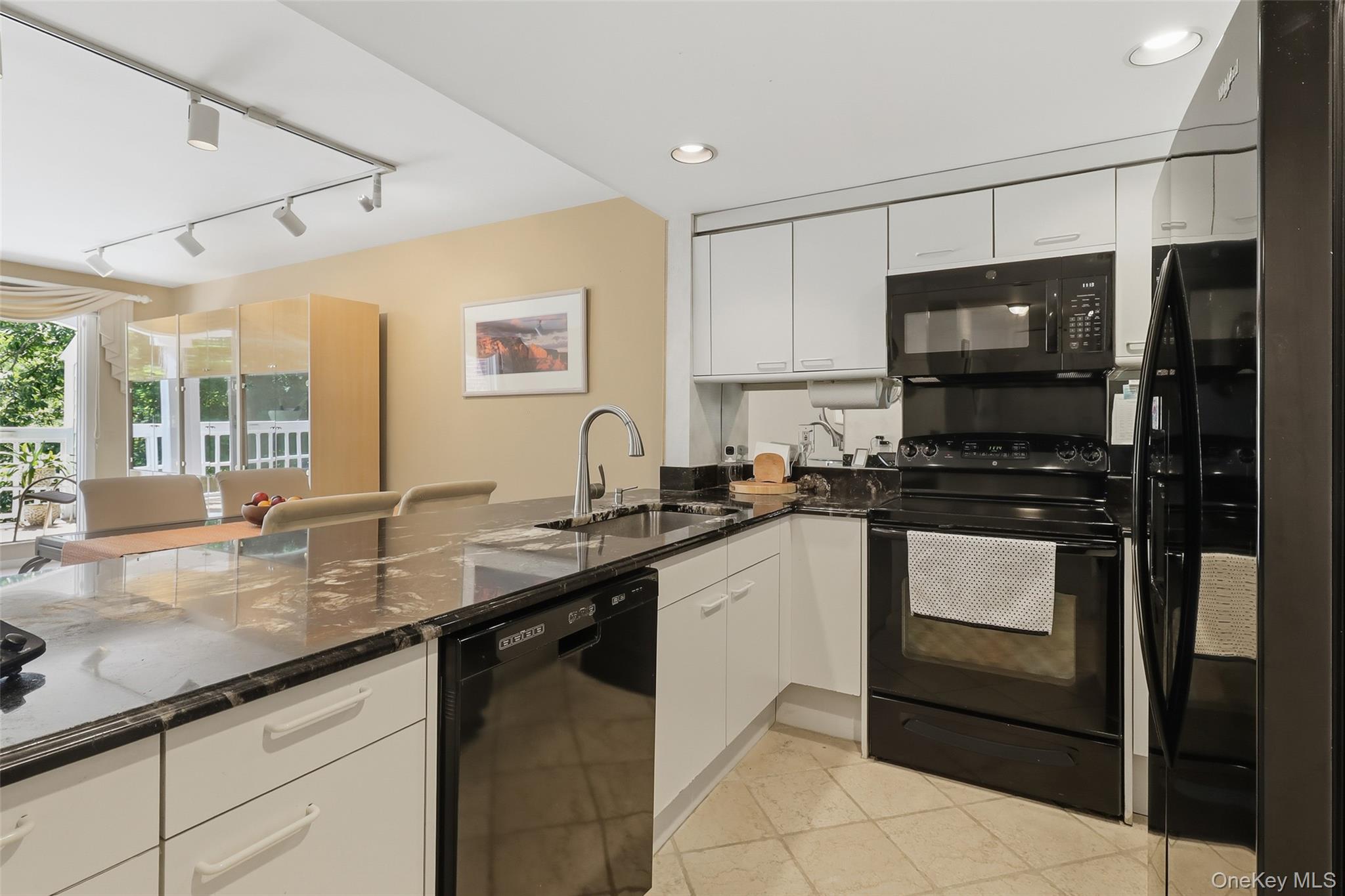 333 North State Road, Unit 45 Briarcliff Manor, NY 10510 - Photo 8 of 26 Kitchen opens to living space.