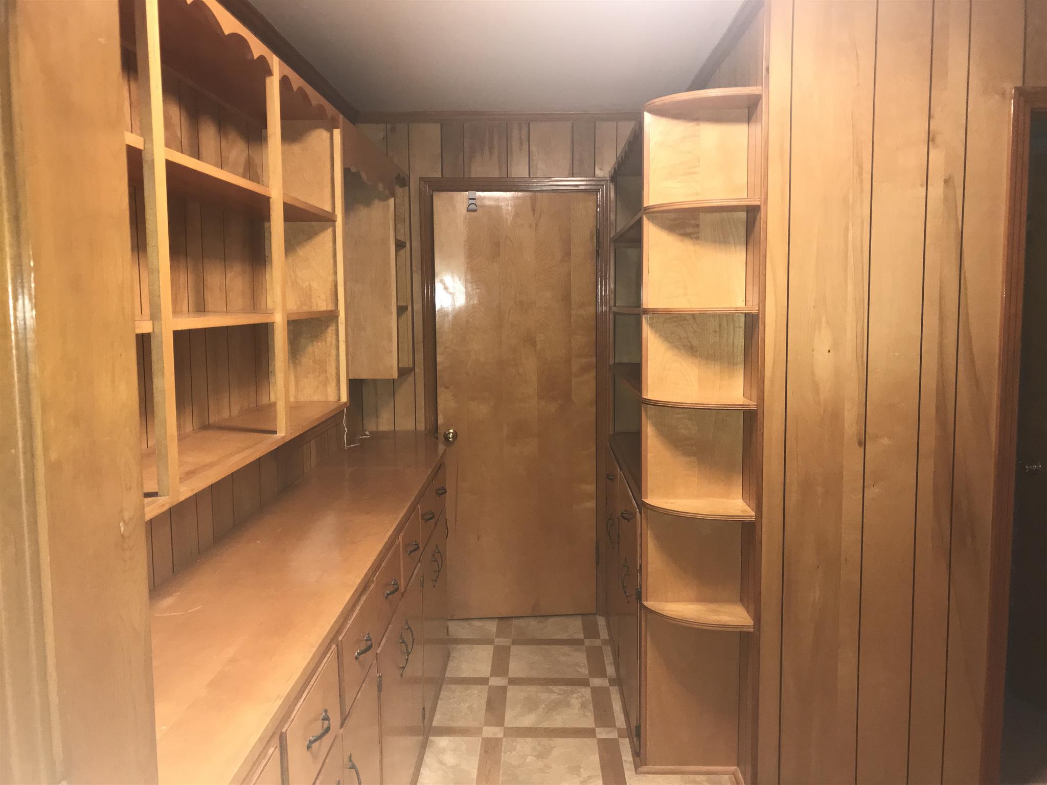 1220 Swamp Road Portland, TN 37148 - Photo 17 of 28 Lots of shelving and storage in utility room